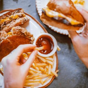 Mouth-watering fast food meal featuring burgers, fries, and refreshing drinks.